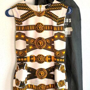 Versus by Versace Stunning sleeveless mini dress with gold hardware .